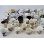 A selection of commemorative and souvenir ceramic mugs.