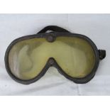 A pair of vintage rubberised eye protector goggles in original condition.