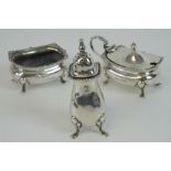 A HM silver cruet set comprising salt, pepperette and mustard pot, liners deficient,