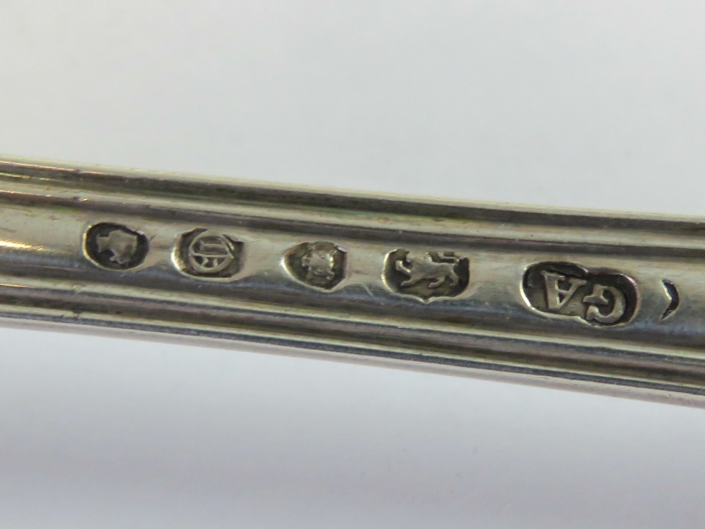 Three HM silver table spoons; one with stag emblem to terminal hallmarked London 1825, - Image 3 of 4