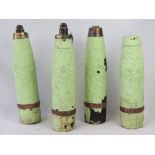 Four WWI British 25Lb smoke artillery projectiles, battlefield finds.