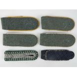 A pair of WWII German shoulder boards, together with two single shoulder boards.