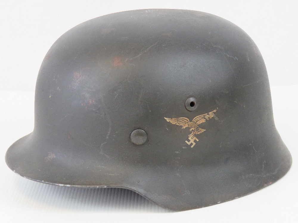 A reproduction WWII German Luftwaffe Infantrymen's helmet having single decal upon,