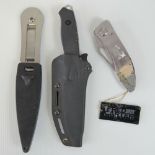 Three designer knives including; a Fred Carter 'Cryoedge' custom blade,