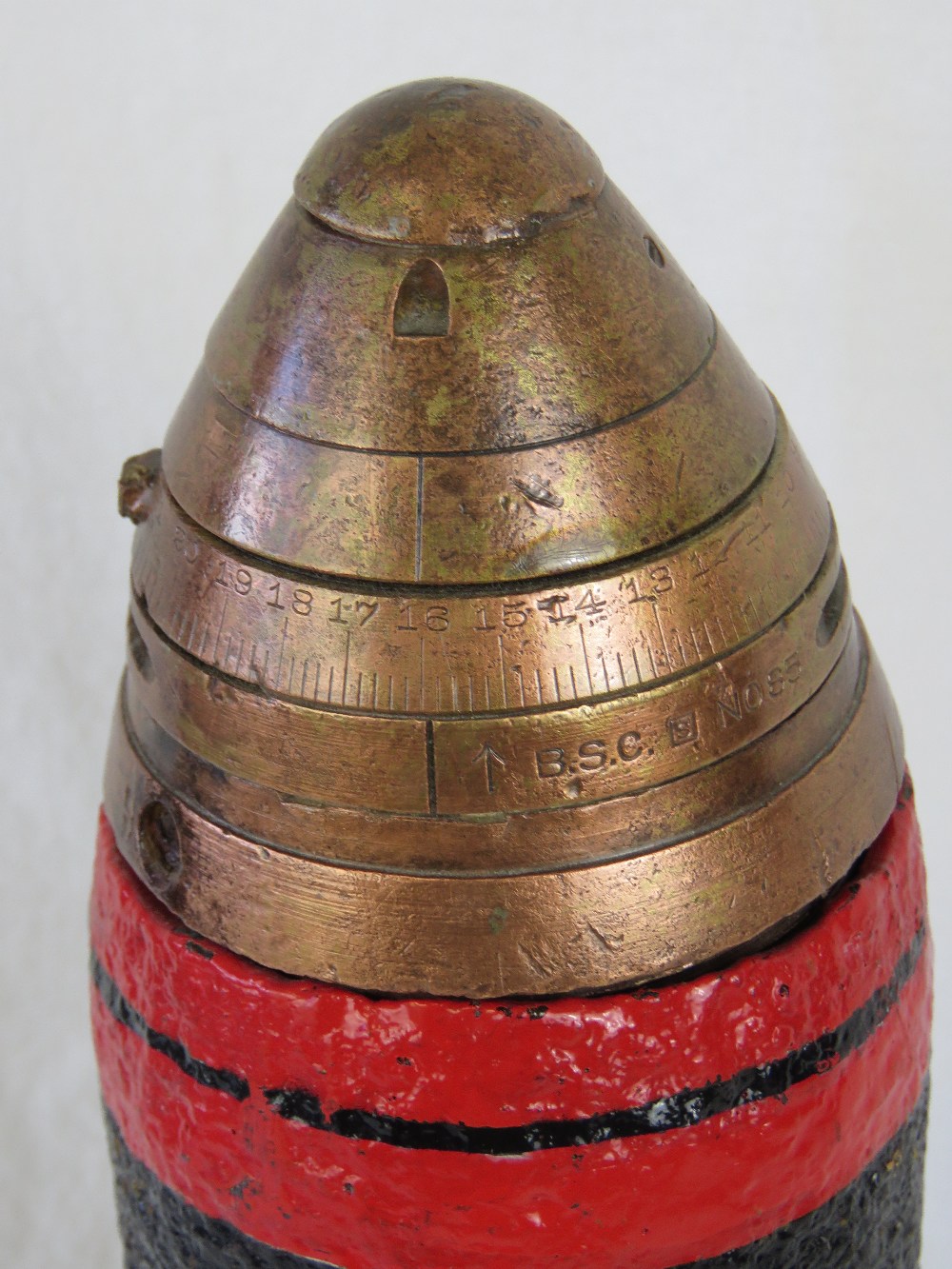 A WWI British 13Lb Artillery round dated 1914 with original fuse head and red banded projectile, - Image 2 of 3