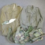 A quantity of British uniform including a REME tunic with trousers, lapel badges and buttons,