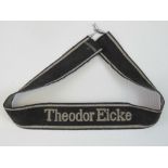 An SS cuff title 'Theodor Eicke', part of the Totenkopf division, 45cm in length.