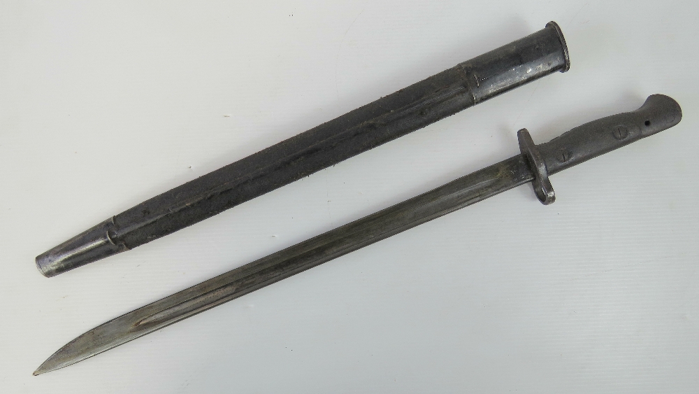 A Lee Enfield 1907 bayonet having 43cm blade marked Wilkinson, complete with twin stitched scabbard. - Image 2 of 5