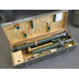A Cold War era East German military bunker periscope within original transit case with accessories.