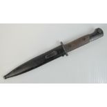 A rare Portuguese M1948 FBP SMG Commando bayonet fighting knife having wooden grip and numbered