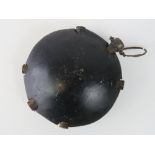 An inert WWI German 'Discushandgranaten' discus grenade or 'Turtle grenade', with fuses and pin.