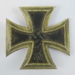 A WWII German Iron Cross 1St Class badge marked '20' to pin (makers marks for C.F. Zimmermann).