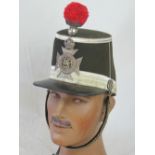 A rare late 19th century peaked hat for the Welsh (Welch) Regiment 7th Cyclists Battalion bearing