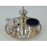 A HM Irish silver Defence Forces trophy cruet set comprising tray, pepperette, salt,