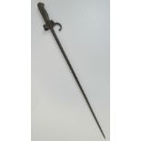 An 1886 French Lebel bayonet with criciform blade and brass hilt, measuring 64cm in length.