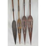 Four early 20th century South Sea Island Tribal decorative ceremonial carved and pierced 'paddles',