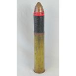 A WWI British 13Lb Artillery round dated 1914 with original fuse head and red banded projectile,