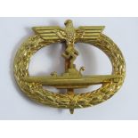 A reproduction WWII German Kriegsmarine U Boat badge marked Frank & Reif to back.
