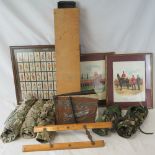 A quantity of assorted militaria including; periscope, WWII USAF photo album, camo trousers, etc.