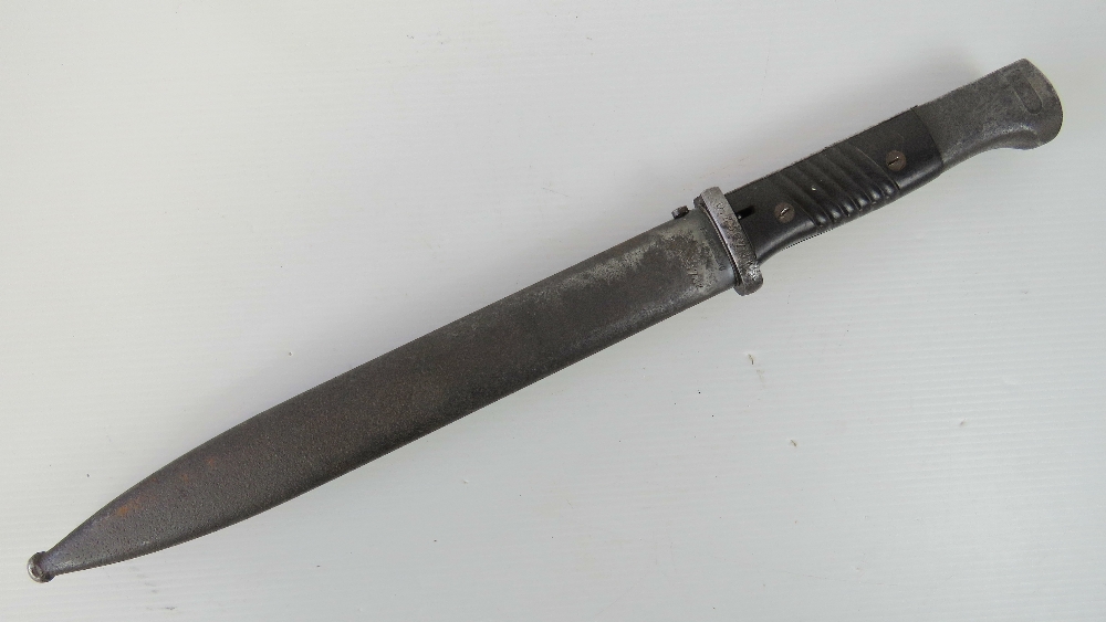 A WWII German K98 bayonet with original scabbard, blade and scabbard numbered 6525 0.