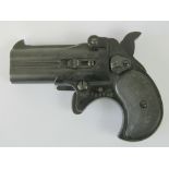 A deactivated (EU Spec) reproduction Derringer .