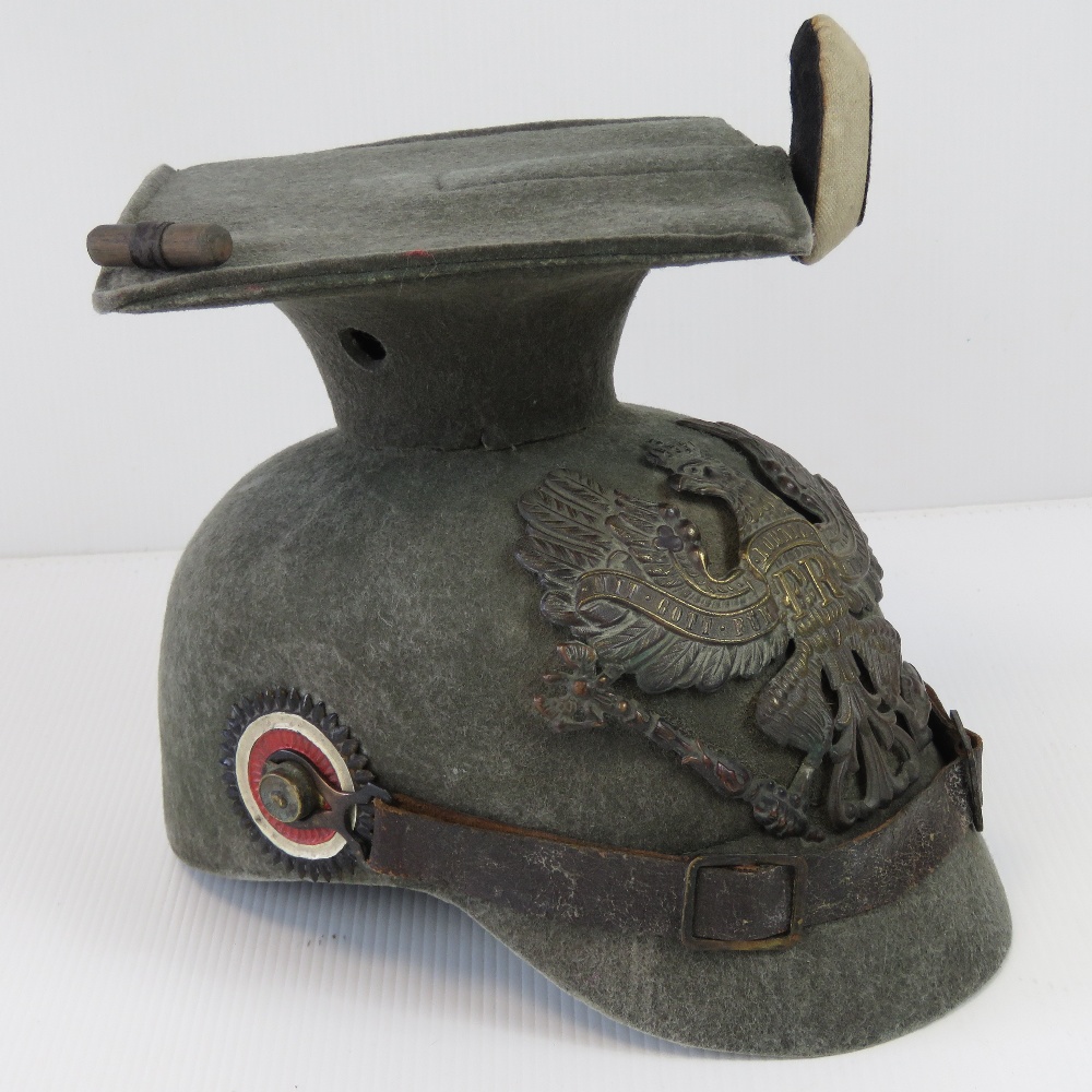 A WWI German Uhlans cavalry helmet dated