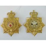 Two embossed gilt brass regimental shako