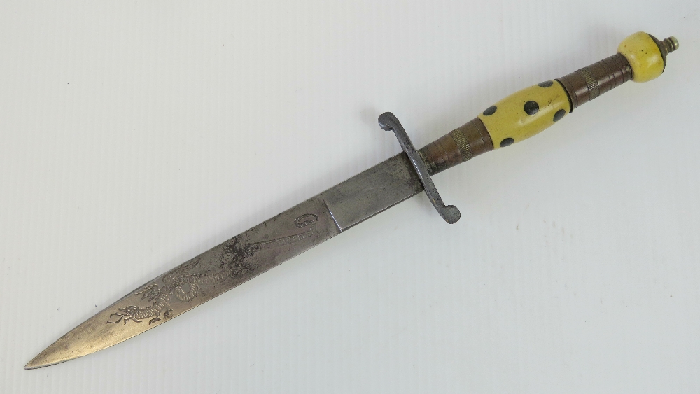 A rare Chinese stiletto dagger with engr