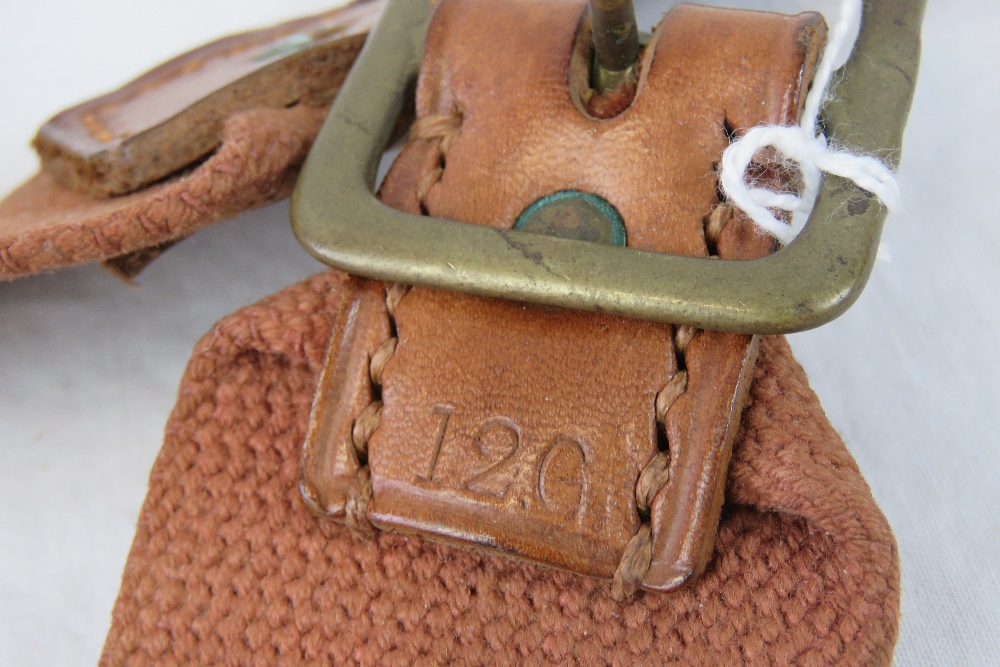 A vintage canvas and leather 12 gauge cartridge belt having brass buckle. - Image 2 of 3