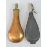 A brass powder flask made by Snider, 2 1/4-3 dram measure, 21cm in length.