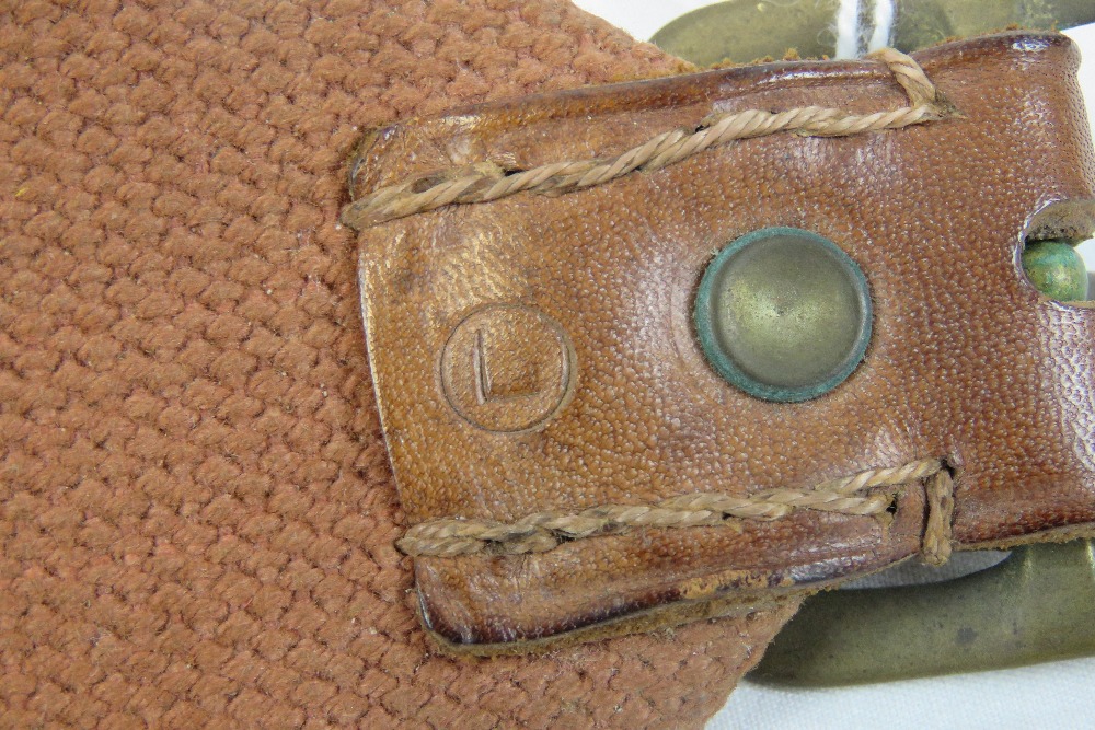 A vintage canvas and leather 12 gauge cartridge belt having brass buckle. - Image 3 of 3