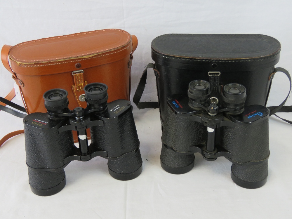 A pair of Tohyoh 10x50 binoculars, with leather case and a pair of Omiya binoculars with case.