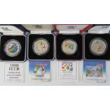 Four silver commemorative coins, mint in