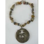 A hardstone necklace having silver T-bar