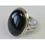 A silver and onyx signet ring, size k, s