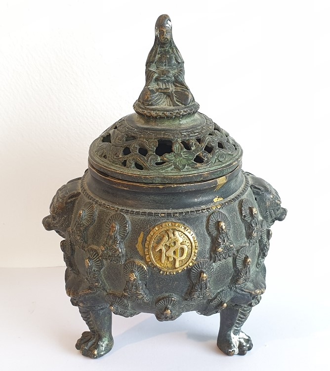A small late 19th early 20th century Chinese bronzed brass lidded censer,