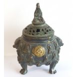 A small late 19th early 20th century Chinese bronzed brass lidded censer,