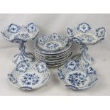 A quantity of blue and white Miessen decorative porcelain of pierced lattice form comprising twin