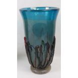 A large blue glass overlaid Murano lily vase decorated with reds, blues and greens, 32cm high.