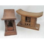 A matched pair of early 20th century tribal wooden neck rests of large proportions,