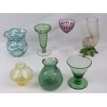 Seven assorted items of colourful glassware.