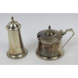 A HM silver pepperette and mustard pot (pot missing spoon and liner),