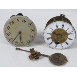 A Cie Continental single drum Paris made brass clock movement having enameled chapter ring with