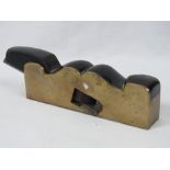A Norris steel soled gun metal shoulder plane with ebony infill and wedge, base plate 19cm.