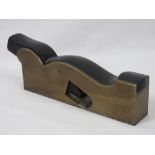 A Norris steel soled gun metal shoulder plane with ebony infill and wedge, base plate 20cm.