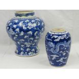 A 19thC Chinese blue and white baluster vase with hand painted prunus decoration, 24.