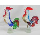 A pair of colourful Murano glass cockerels, each standing 34cm high.