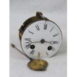 A Japy Freres 19th century brass twin drum clock movement having enamelled dial with Roman numerals,