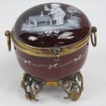 A delightful Continental lidded glass pot in the style of Mary Gregory having enamel decoration in