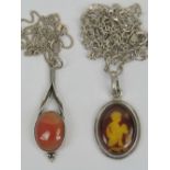 A carnelian and white metal pendant on fine silver chain,